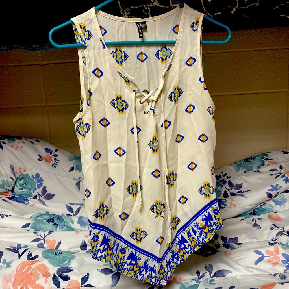 Cream tank top with blue and gold patterns